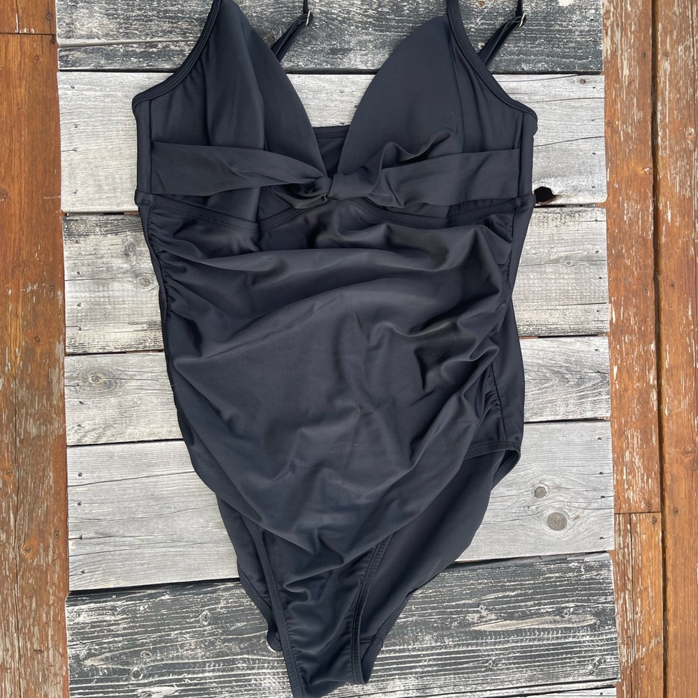 Black one piece swimsuit with twist rouched detail